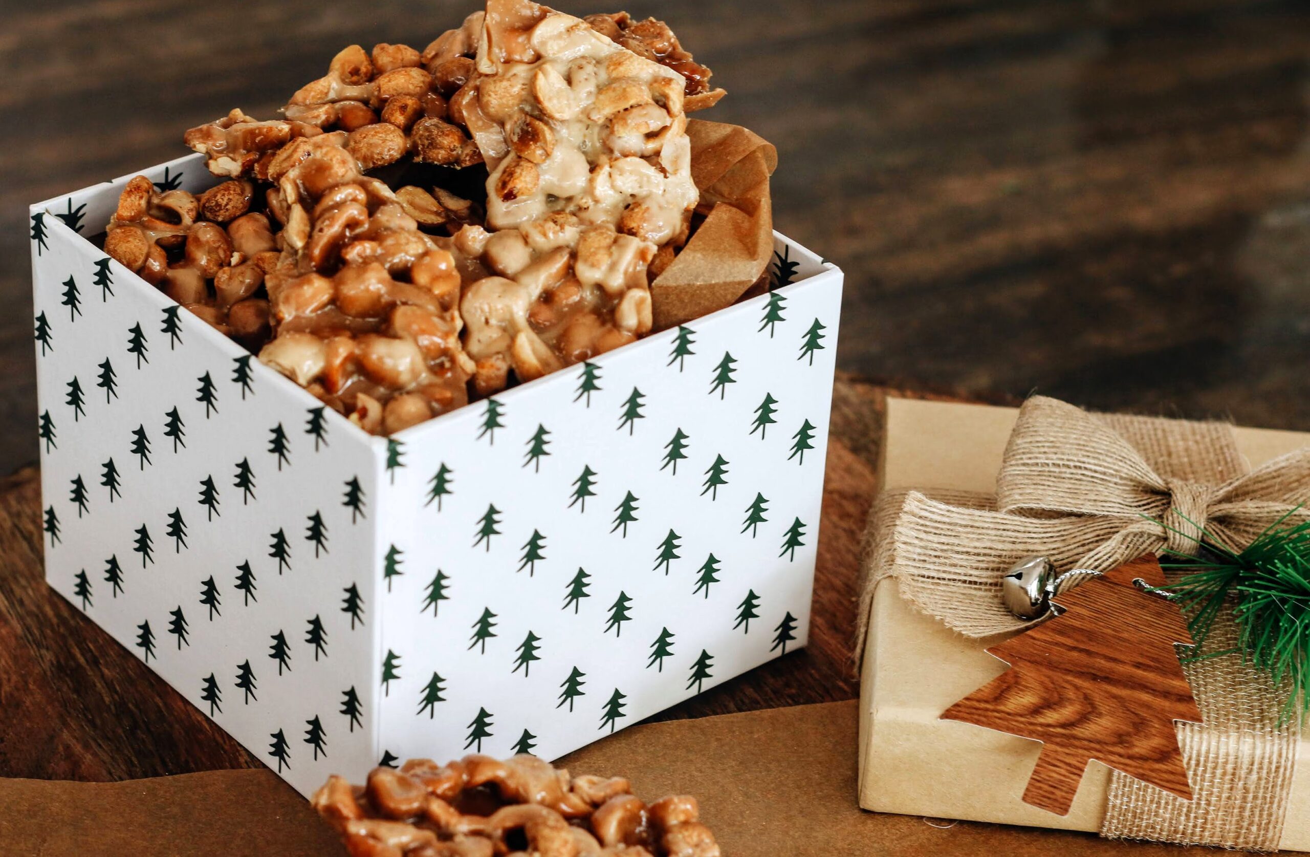 A box of nuts and a gift on the table