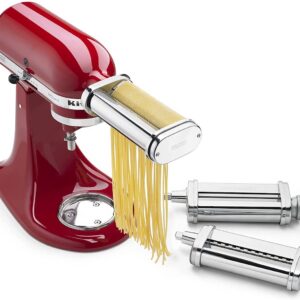 A red stand mixer with pasta machine and ravioli maker.