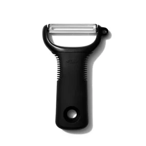 A black plastic peeler with a handle.
