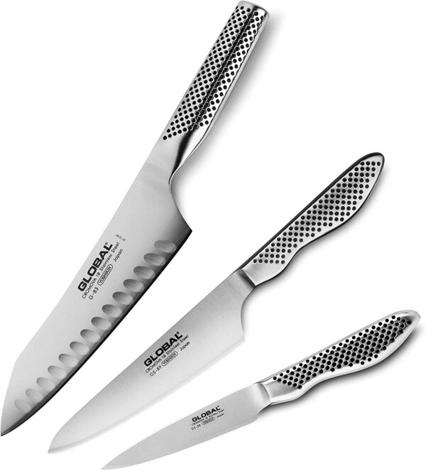 A set of three knives with different designs on them.