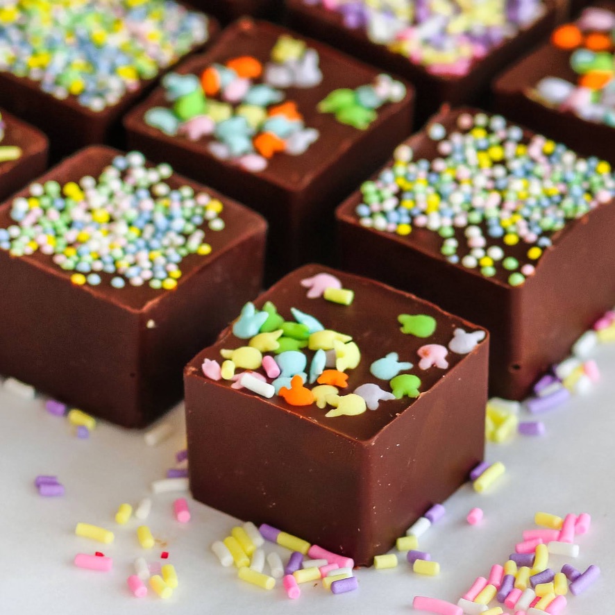 A close up of chocolate squares with sprinkles